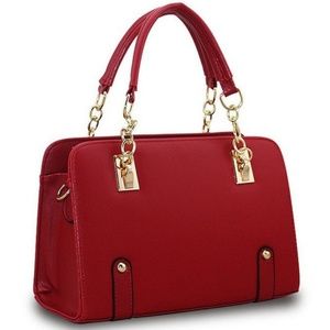 Red purse with gold hardware